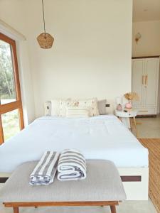 Tuscan Breeze, Nandi Hills客房内的一张或多张床位