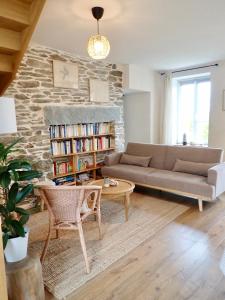 Posezení v ubytování Le Pré de la Mer Le Gîte