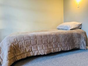 Postel nebo postele na pokoji v ubytování Merrylees Hotel