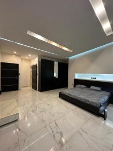 En eller flere senge i et værelse på Jadet