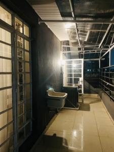 a bathroom with a sink and a toilet at Tevody Heights in Nairobi