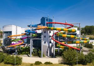 a water park with a colorful water slide at Premium Glamour Apartment by Krakow Home in Kraków