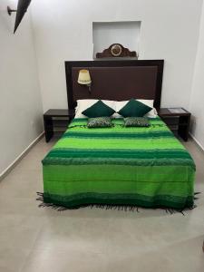Letto o letti in una camera di Riad Le Lieu