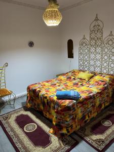 Letto o letti in una camera di Riad Le Lieu