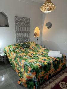 Letto o letti in una camera di Riad Le Lieu
