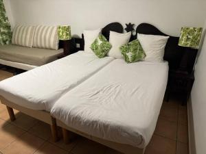 Postel nebo postele na pokoji v ubytování Le Flora, 2 chambres, vue mer