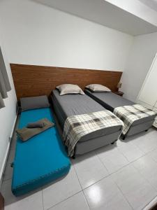 Ένα ή περισσότερα κρεβάτια σε δωμάτιο στο Apartamento juntinho a estação