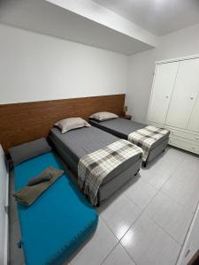 Ένα ή περισσότερα κρεβάτια σε δωμάτιο στο Apartamento juntinho a estação