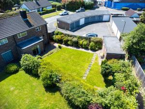 an aerial view of a yard in a house at The Secret Garden - West Sussex - 3BR House with Drive in Crawley