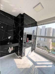 Ένα μπάνιο στο Apartamento em Itapema +6 φωτογραφίες