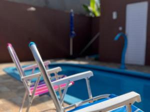 Sundlaugin á CASAS com PISCINA SENSACIONAIS NO CENTRO - Residencial Tchê eða í nágrenninu