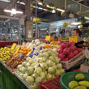 a market with many different fruits and vegetables on display at Self Check in 10min to BKKairport Train2Town Near Mall Local Market WIFI in Bangkok