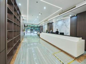 Лобі або стійка реєстрації в Metropolo Hotel Jiangyin Hongqiao Road Baiye Plaza