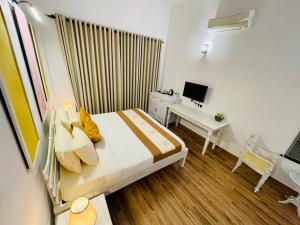 Postel nebo postele na pokoji v ubytování Ayur Ayur White Sail Villa