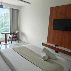 Postel nebo postele na pokoji v ubytování Hotelmaple tree