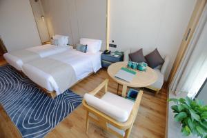 Postel nebo postele na pokoji v ubytování 臻程酒店北京西铁营地铁站店