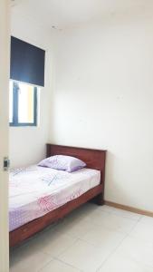 a bedroom with a bed in a room at Homestay Vista Alam in Shah Alam +13 photos
