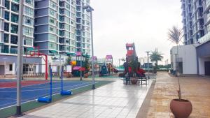 a playground in a city with a playground at Homestay Vista Alam in Shah Alam