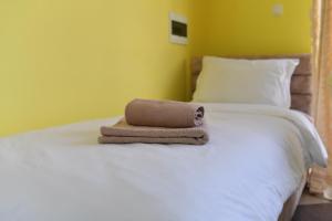 Ένα ή περισσότερα κρεβάτια σε δωμάτιο στο Apartmani Ad fines