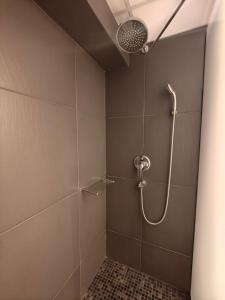 Koupelna v ubytování Elysion Hotel