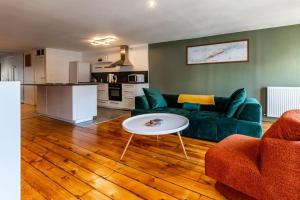 Køkken eller tekøkken på Le Liberté Coeur de ville Duplex