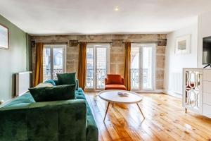 Et opholdsområde på Le Liberté Coeur de ville Duplex