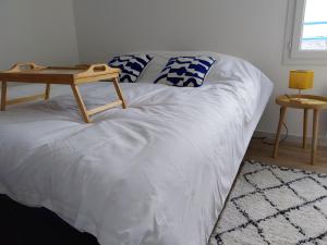 Postel nebo postele na pokoji v ubytování Les goélands