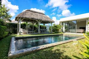 Πισίνα στο ή κοντά στο Villa Dodo, 3 chambres Domaine securise Grand Baie