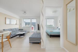 Posteľ alebo postele v izbe v ubytovaní Jantar Apartamenty Bliżej Morza