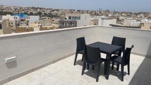 Balkón nebo terasa v ubytování Bright and Convenient Penthouse in Central Malta