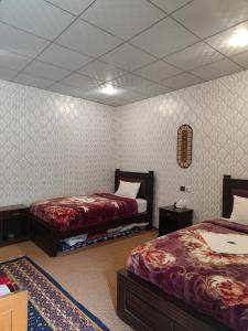Postel nebo postele na pokoji v ubytování Passu Cones Hotel
