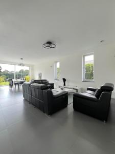 Posezení v ubytování Moderne Villa aux portes de Bruxelles!