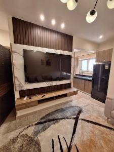 TV a/nebo společenská místnost v ubytování Super luxury hotel apartment