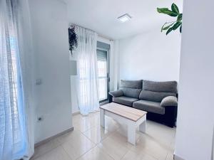 Ruang duduk di Apartamento Familiar a 1 Min del Mar