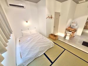 Postel nebo postele na pokoji v ubytování HOTEL fah