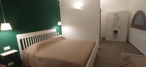 Postel nebo postele na pokoji v ubytování Casa di Lele
