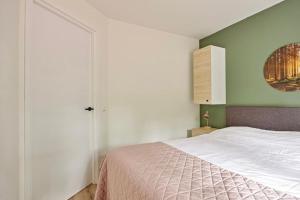 Postel nebo postele na pokoji v ubytování Heemhoeve Lodge
