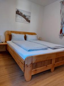 Posteľ alebo postele v izbe v ubytovaní Ferienwohnung Gstreinthaler