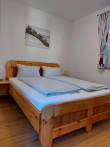 Posteľ alebo postele v izbe v ubytovaní Ferienwohnung Gstreinthaler