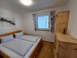 Posteľ alebo postele v izbe v ubytovaní Ferienwohnung Gstreinthaler