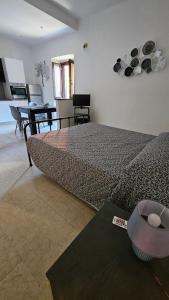 Postel nebo postele na pokoji v ubytování Loft Delle Scalette