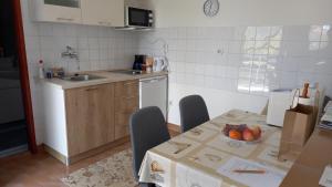 Kuchyň nebo kuchyňský kout v ubytování Felix Apartment Biograd