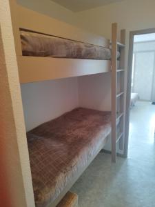 Katil atau katil-katil dalam bilik di Appartement Superbagnères St Aventin