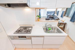 Dapur atau dapur kecil di Otsuka house with 3BR near the Yamanote line