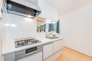 Dapur atau dapur kecil di Otsuka house with 3BR near the Yamanote line