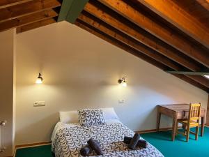 Postel nebo postele na pokoji v ubytování Apartamento el Remiendu Pegau + 23 fotografií