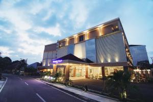 a building on the side of a street at Golden Tulip Essential Belitung in Tanjungpandan