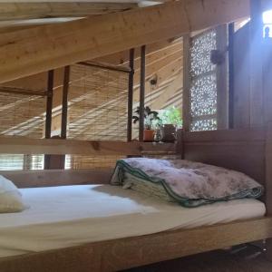 a bedroom with two bunk beds in a room at Grande yourte in Boulc