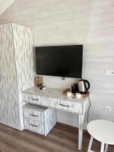 TV a/nebo společenská místnost v ubytování Alicra Hotel Çıralı