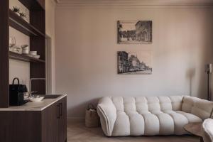 Area soggiorno di Zurenborg Suites